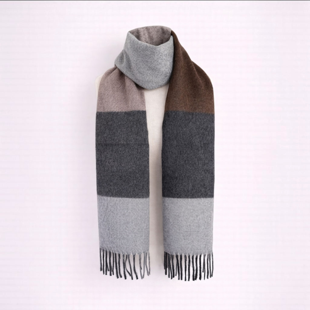Alpaca wool scarf in soft neutral tones, classic winter layering piece.