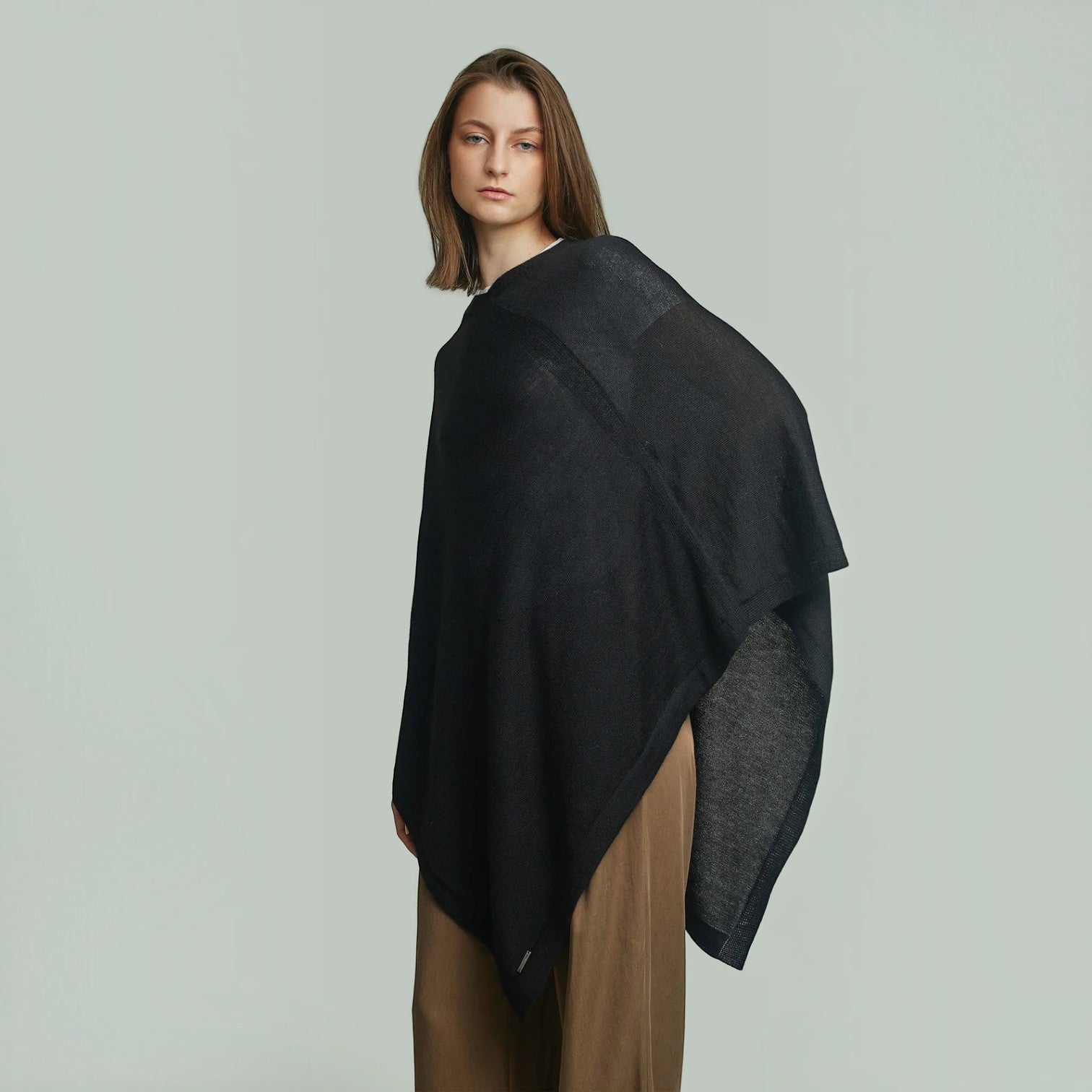Women’s Almendra 100% Baby Alpaca poncho in classic black