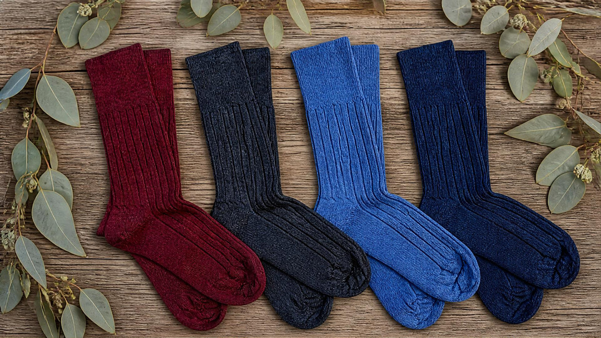 Alpaca Ribbed socks laying in a Line surrounded by Australian Natives