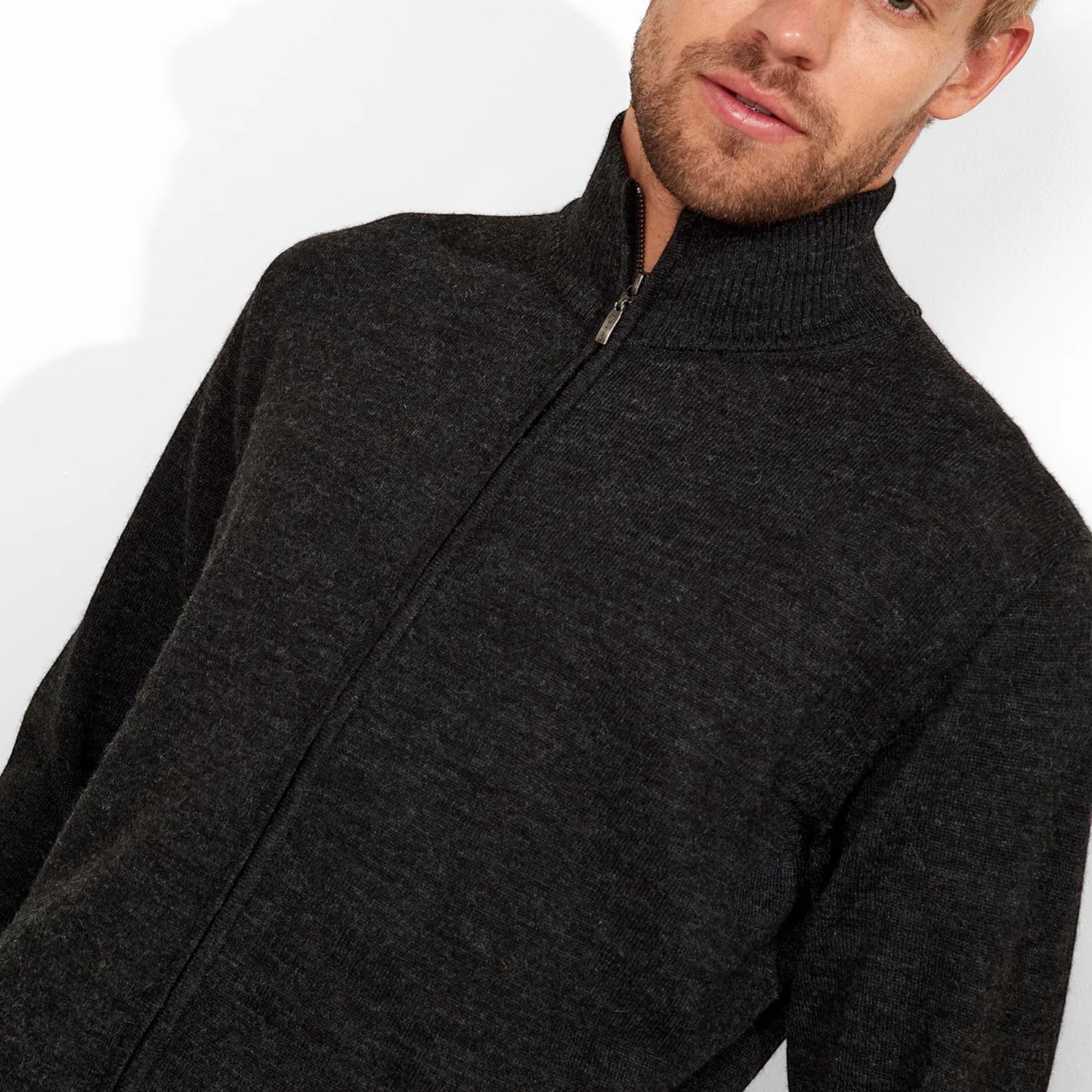 Close-up of Men’s premium Baby Alpaca zip sweater in versatile charcoal grey