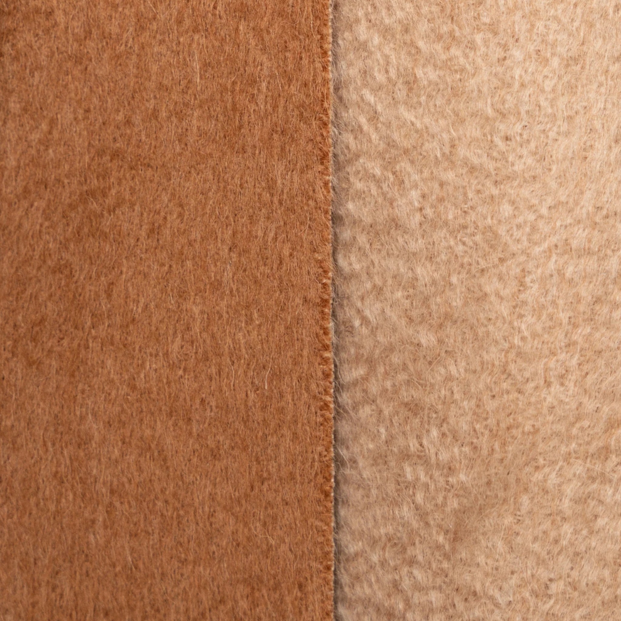Close up of Beige and camel Suri alpaca scarf styled to showcase its elegant contrasting neutral sides
