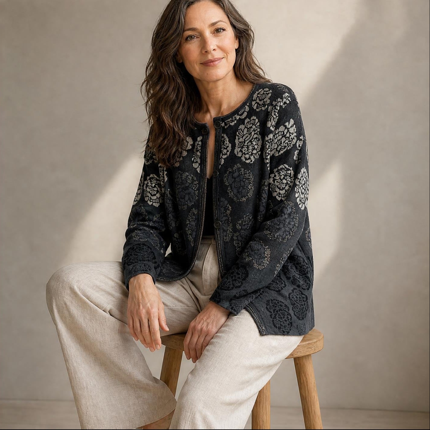 Women’s alpaca cardigan with chrysanthemum inspired botanical design