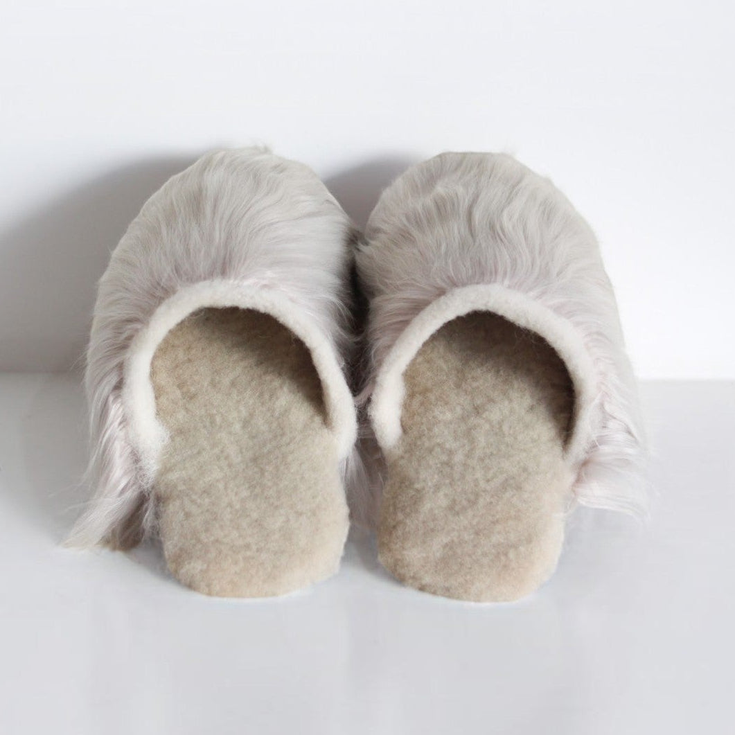 Handcrafted Suri alpaca slippers in a natural sand colour, made in Peru