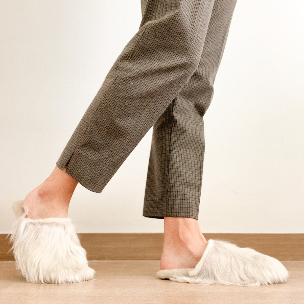Luxury handcrafted Suri alpaca house slippers with silky fur and leather soles