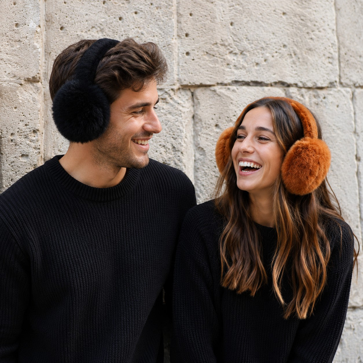 Alpaca fur ear muffs worn outdoors by man and women, warm fluffy ear warmers.