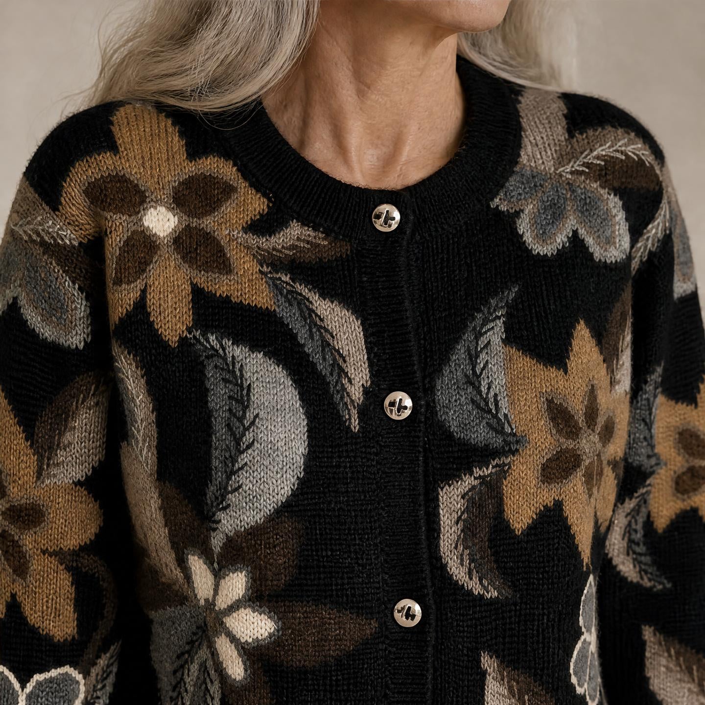 Black hand knitted alpaca cardigan with beige and grey floral details