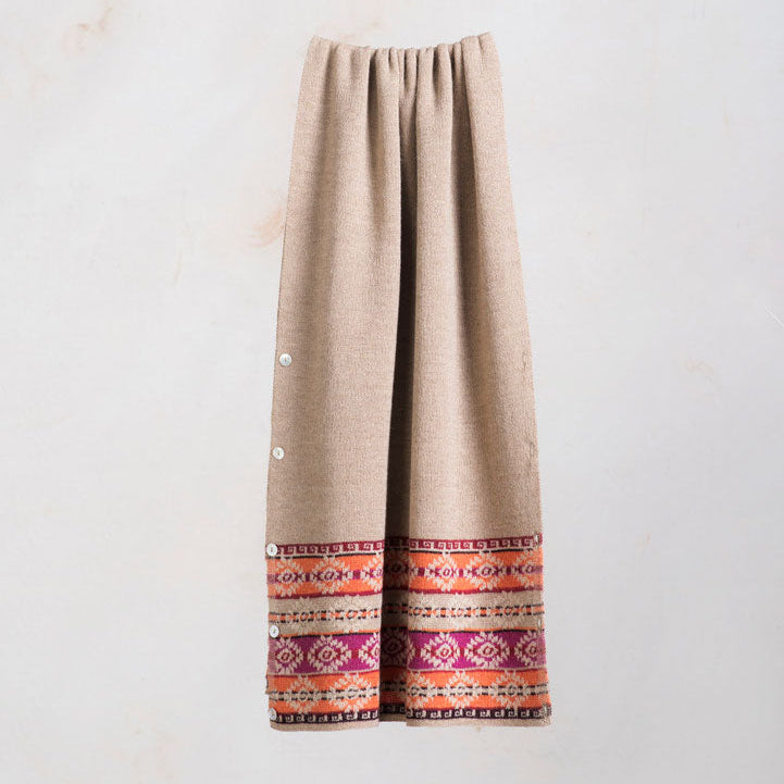 Natural alpaca stole with colour detail and buttons, versatile winter wrap.