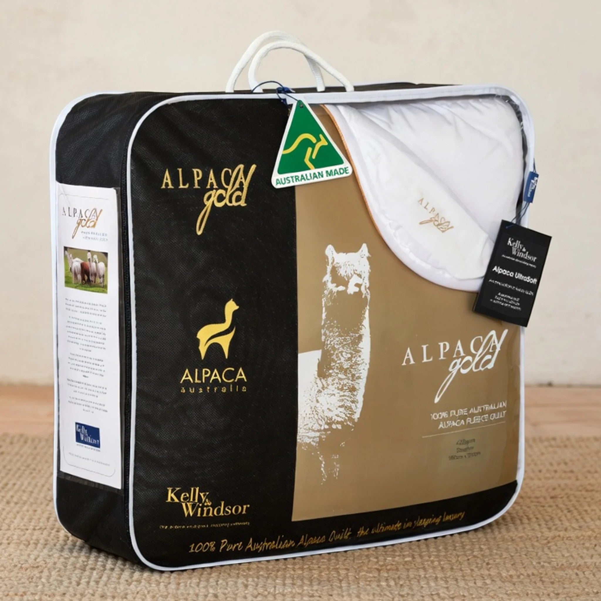 Alpaca gold quilt packaging with visible branding on a beige background