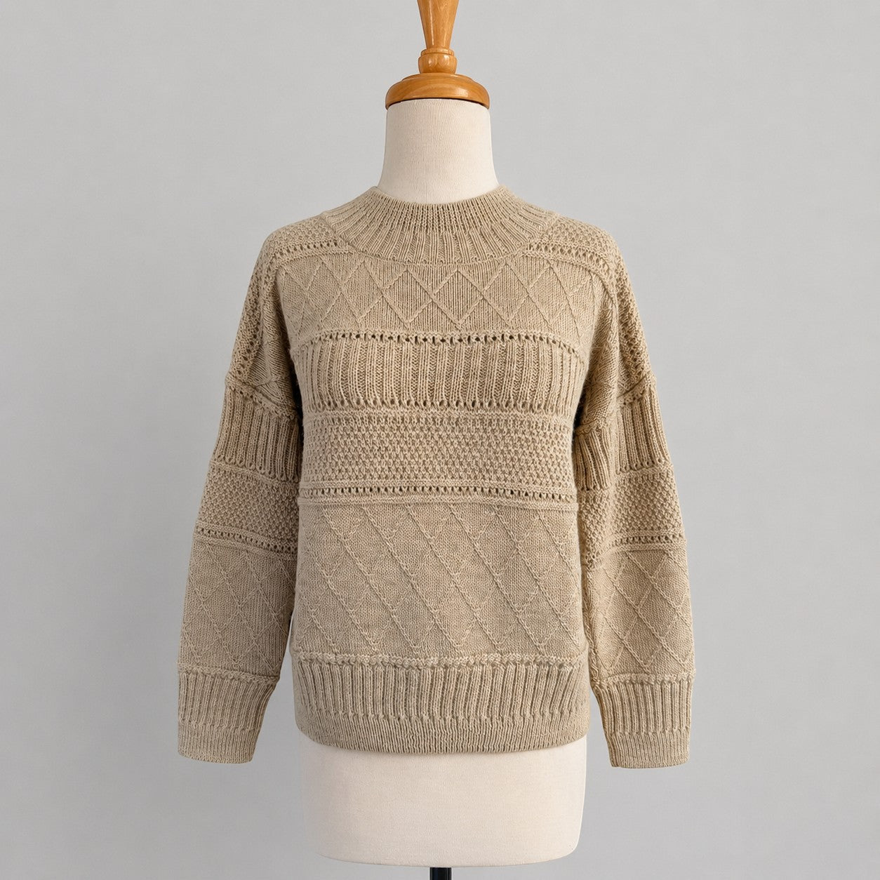 Camel alpaca high neck sweater with cable detail, soft warm winter knitwear.