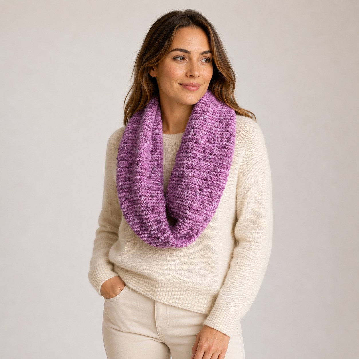Textured pink alpaca infinity scarf with soft tonal detailing