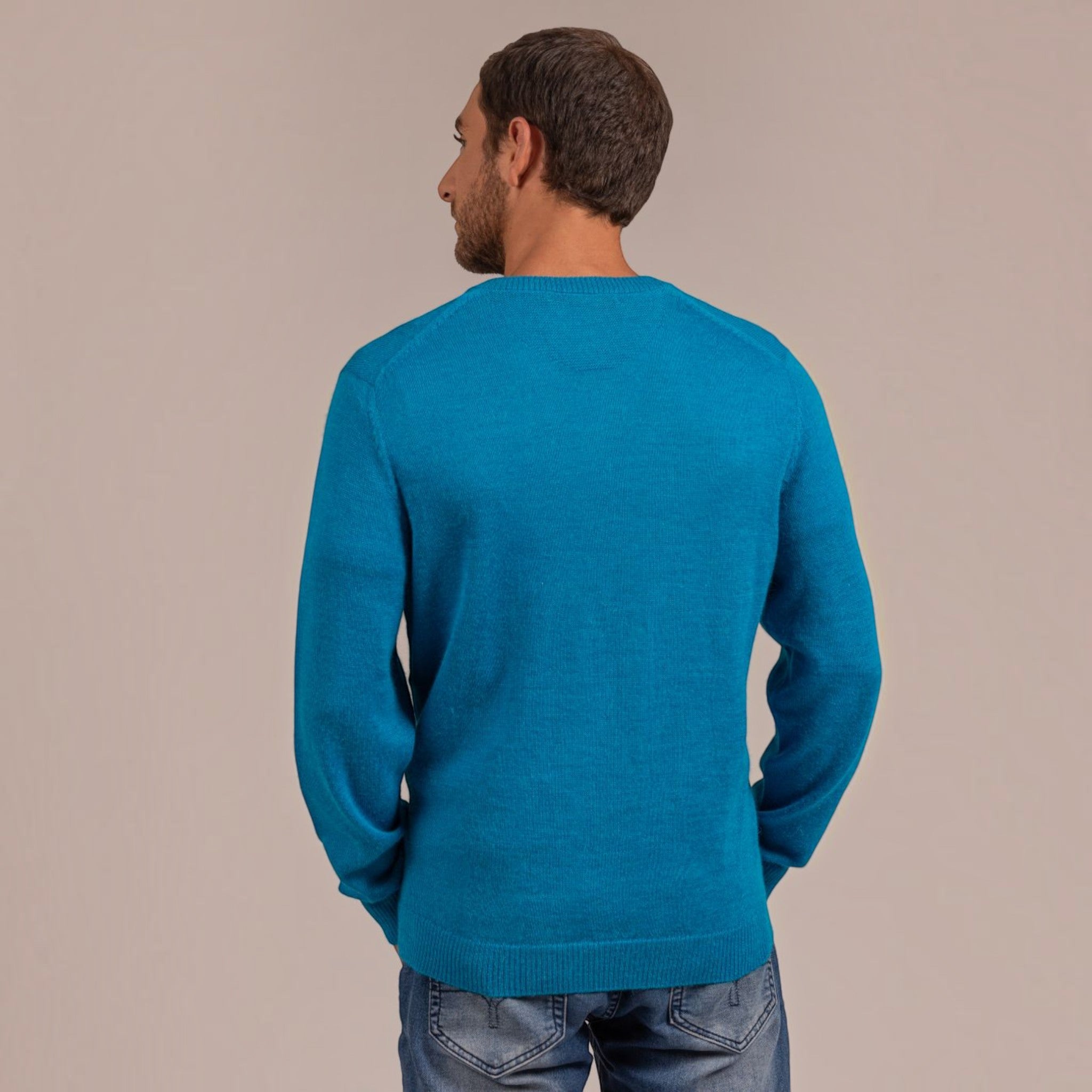 Men’s Kuna alpaca V-neck sweater shown on model