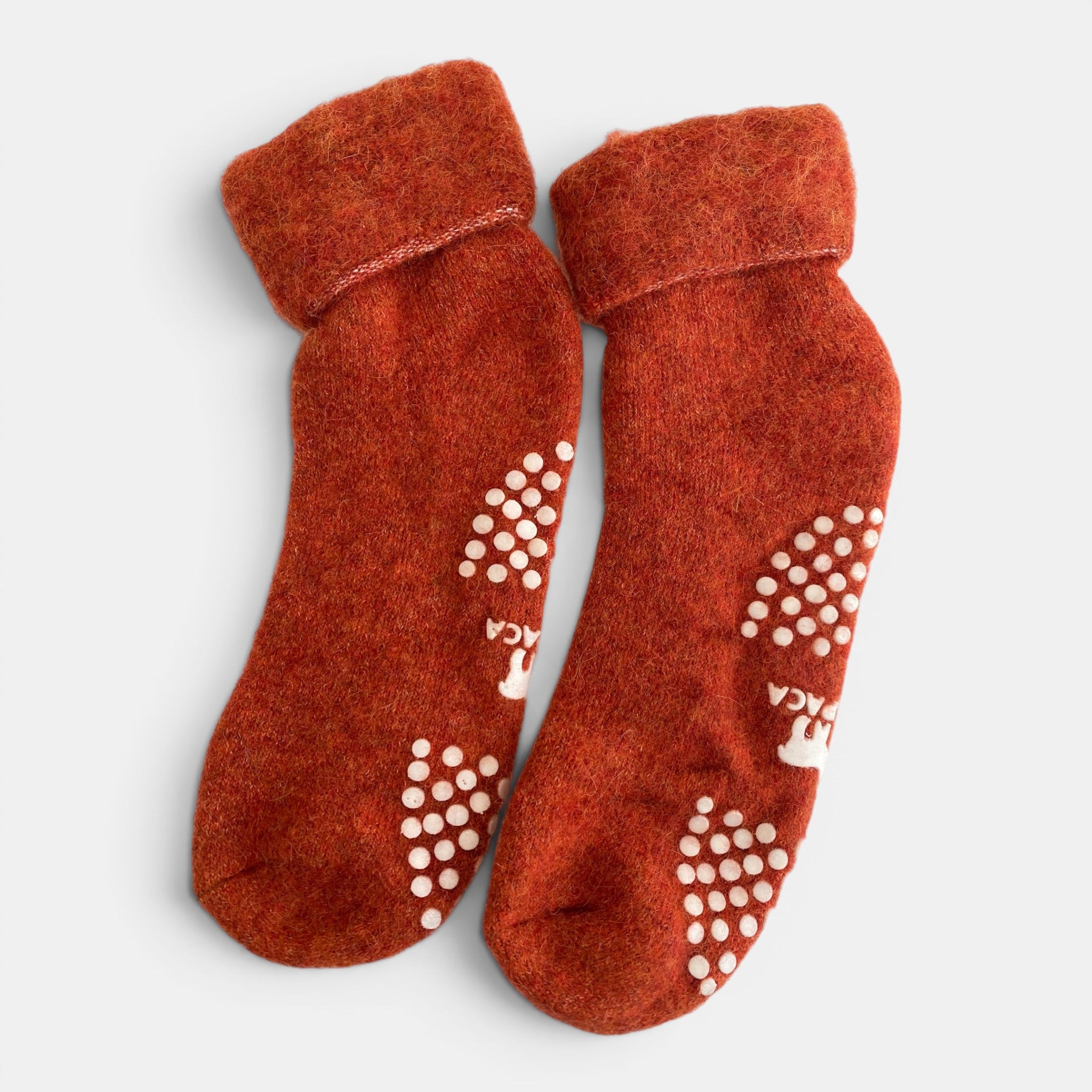 Alpaca slipper socks in blue with non-slip soles, warm cosy socks for home.