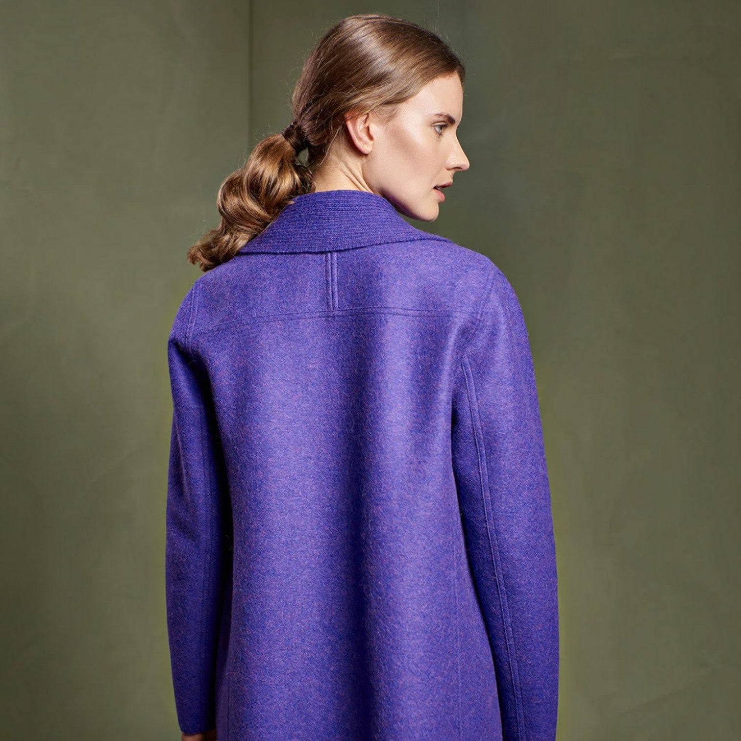 Back view of the purple alpaca wool coat with relaxed straight silhouette