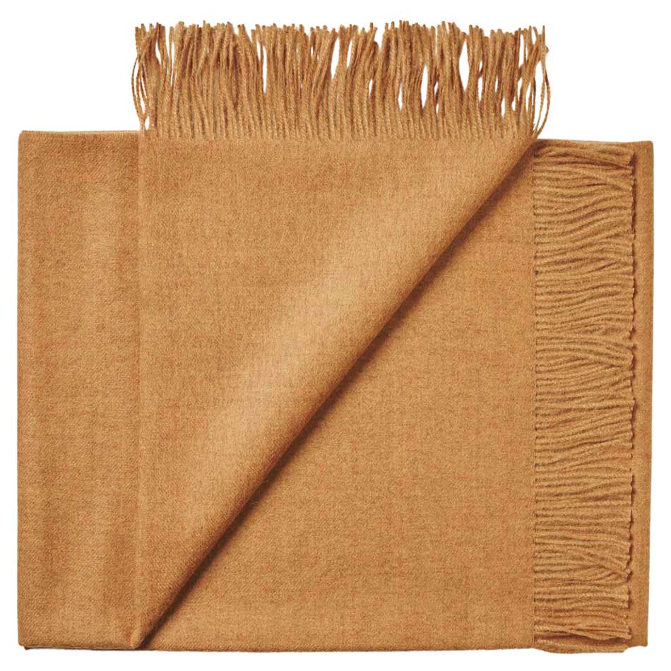 Folded mustard soft alpaca throw rug with natural texture for home gifting