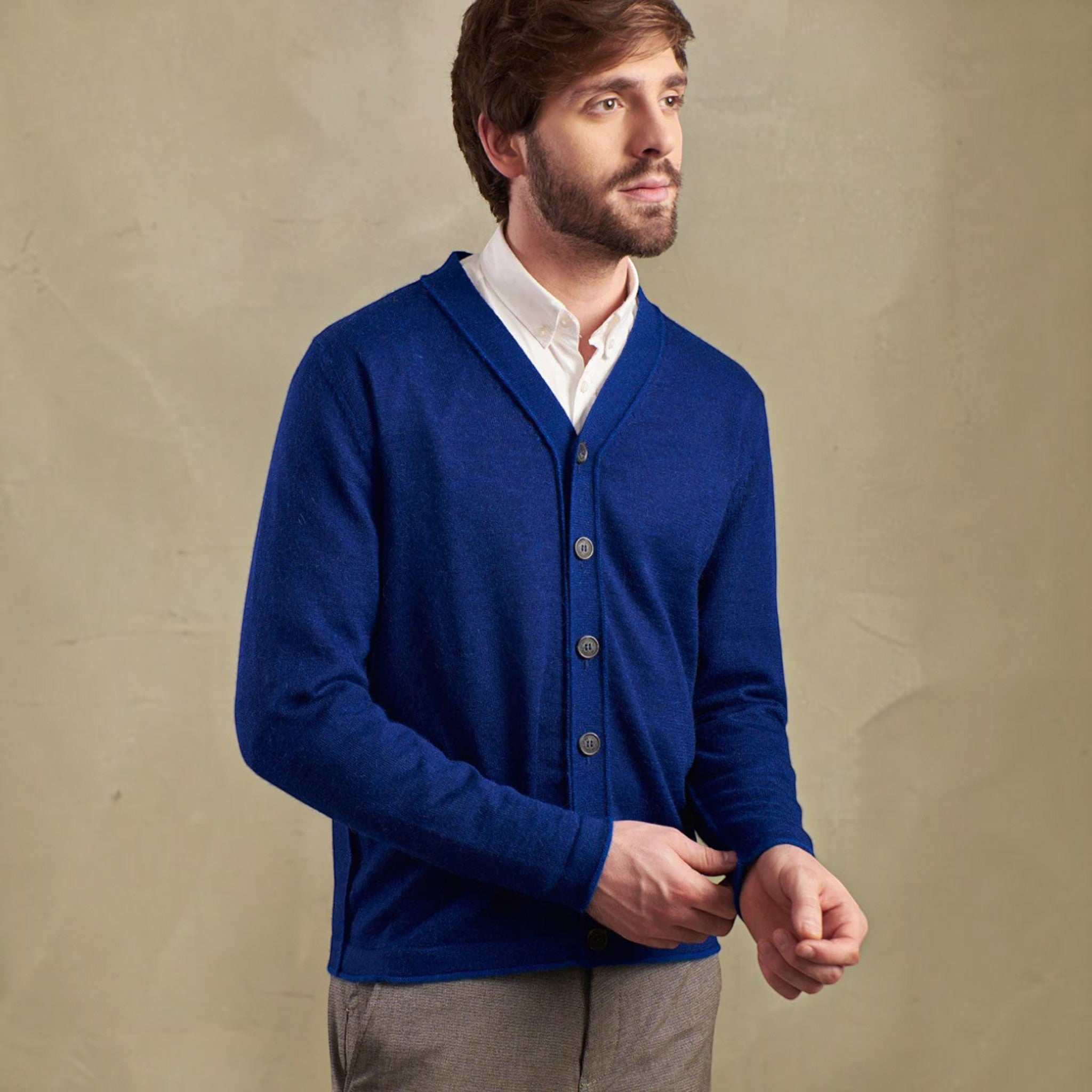 Classic men’s alpaca button cardigan on studio model