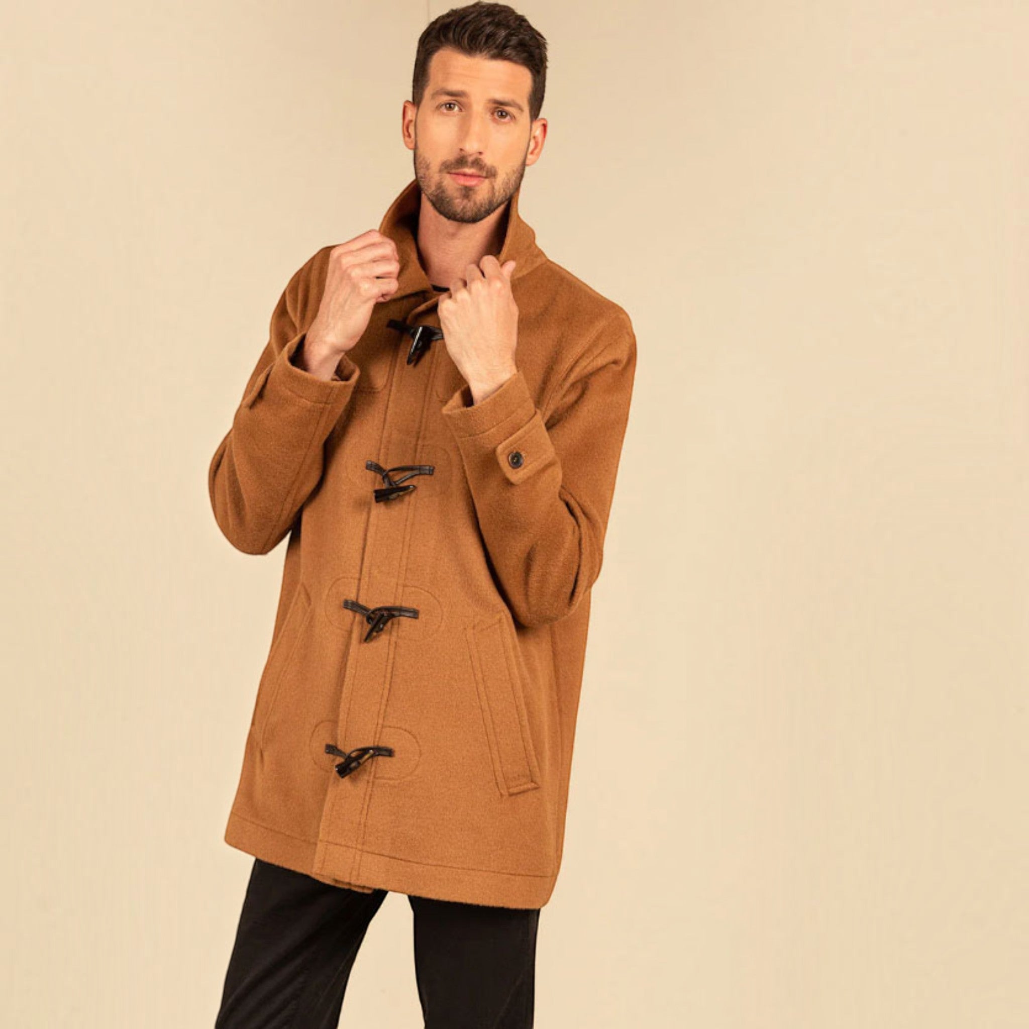 Man wearing the Troiry Baby Alpaca Duffle Coat in Paco