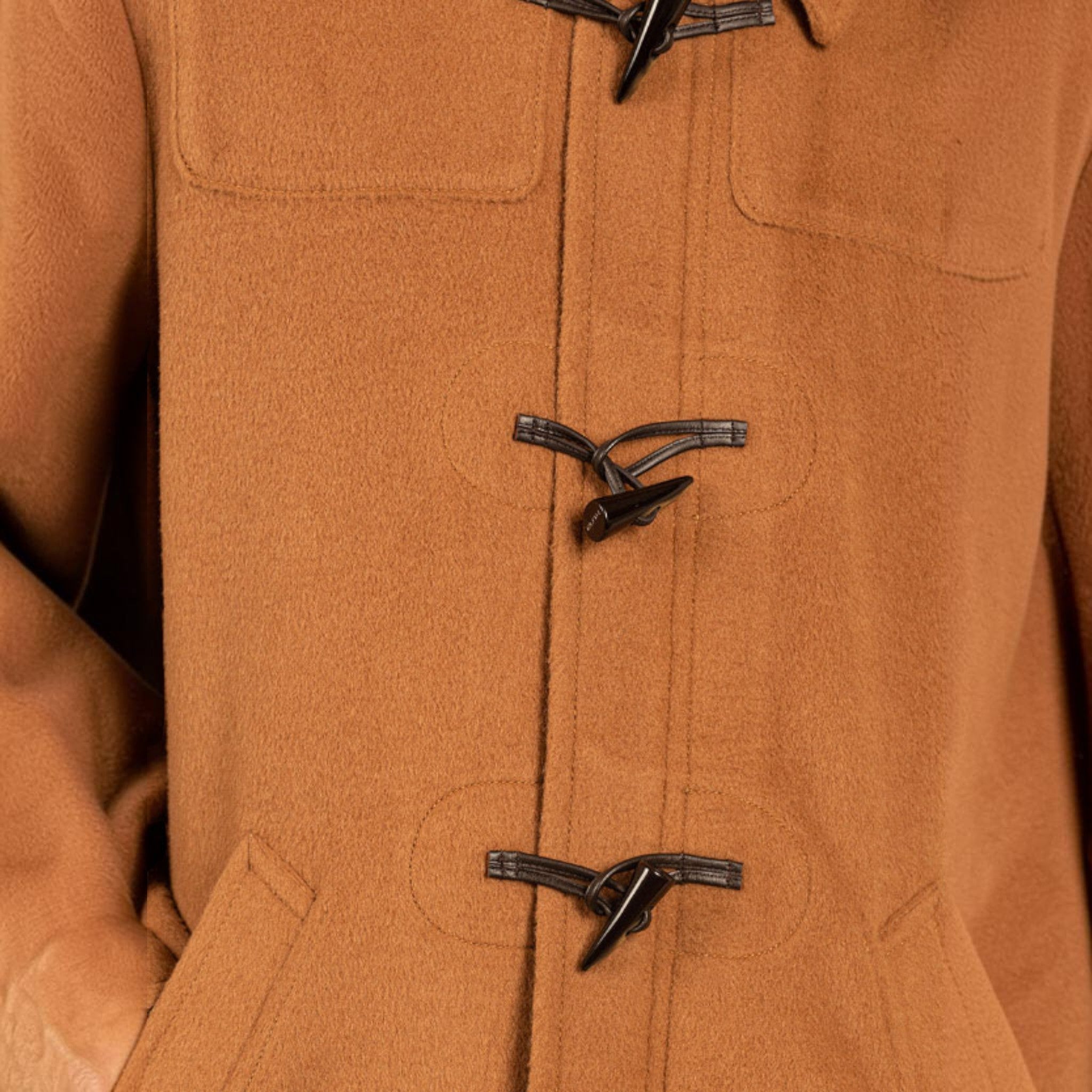 Close-up of horn toggles and soft Baby Alpaca coat texture
