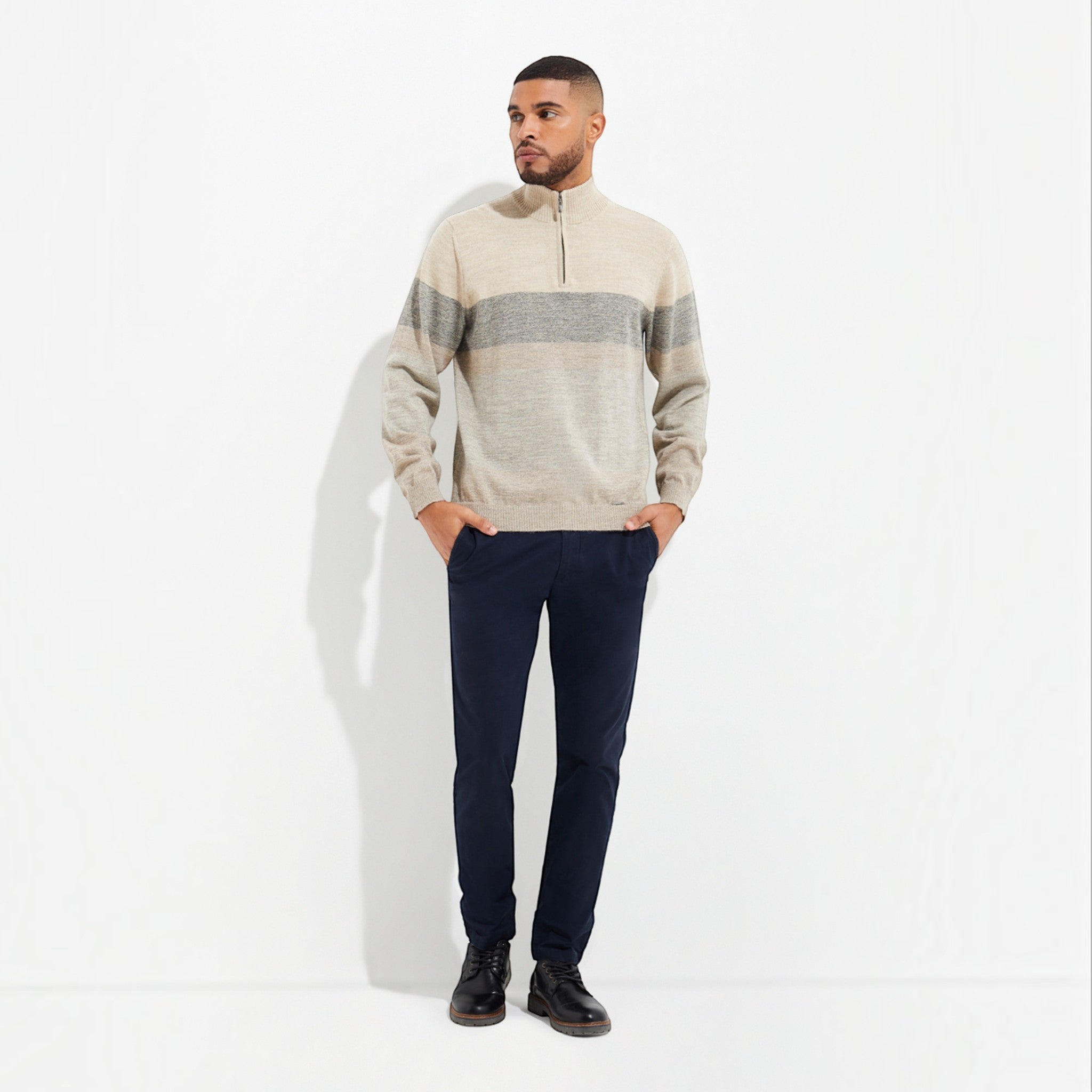 Model wearing the Yonas 100% Baby Alpaca quarter-zip sweater in Lluvia