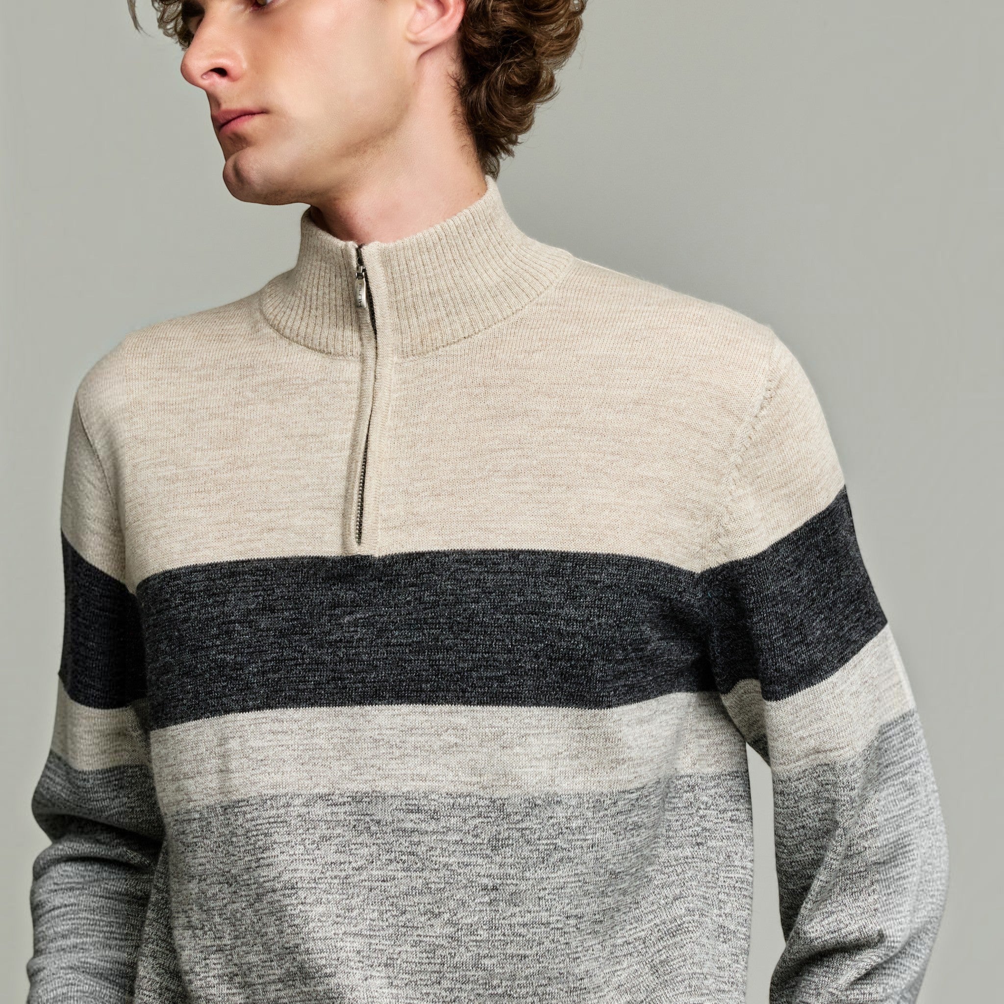Model wearing the Yonas 100% Baby Alpaca quarter-zip sweater in mocha