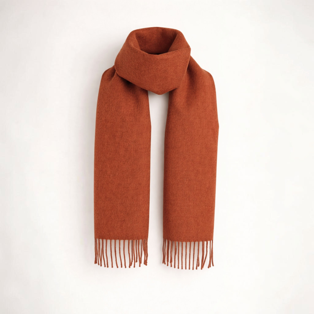 Soft baby alpaca scarf in Pumpkin Orange, warm lightweight winter accessory.