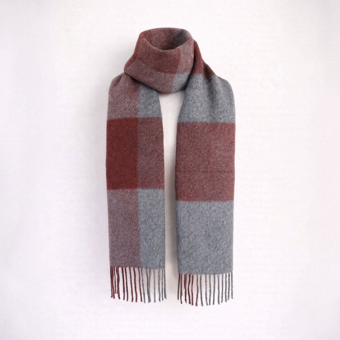 Luxury alpaca scarf with woven check detail in grey and red, elegant natural fibre accessory.