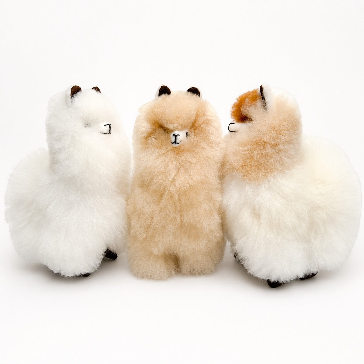 Fluffy alpaca toys made from alpaca fur, natural cream colour.