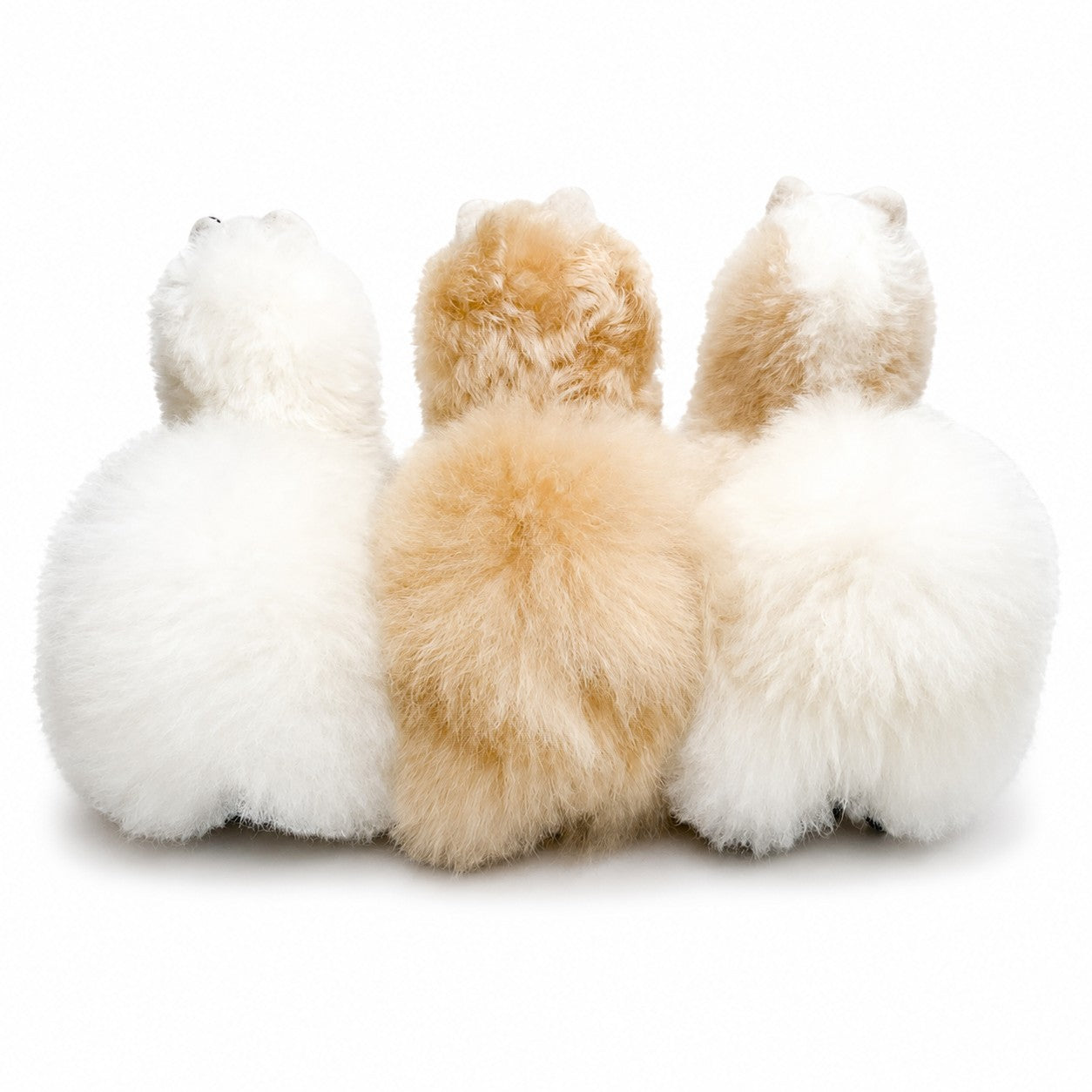 Small alpaca-shaped fur toy, backside, soft luxury gift from Peru.