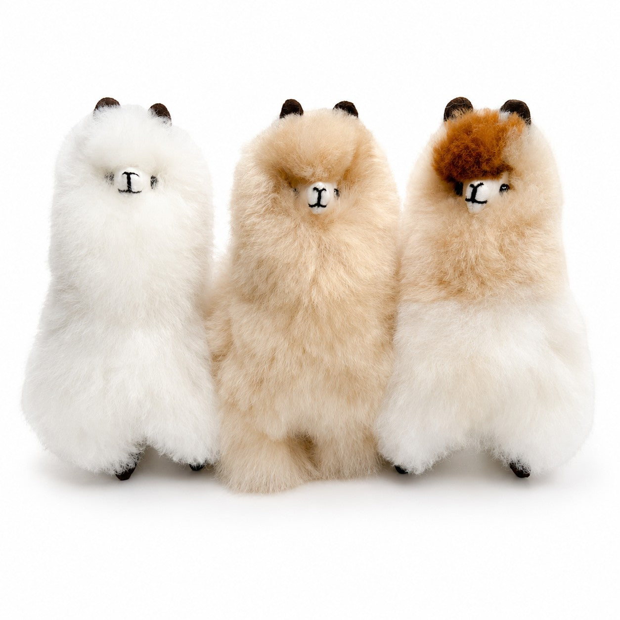 Small alpaca-shaped fur toys, soft luxury gift from Peru.