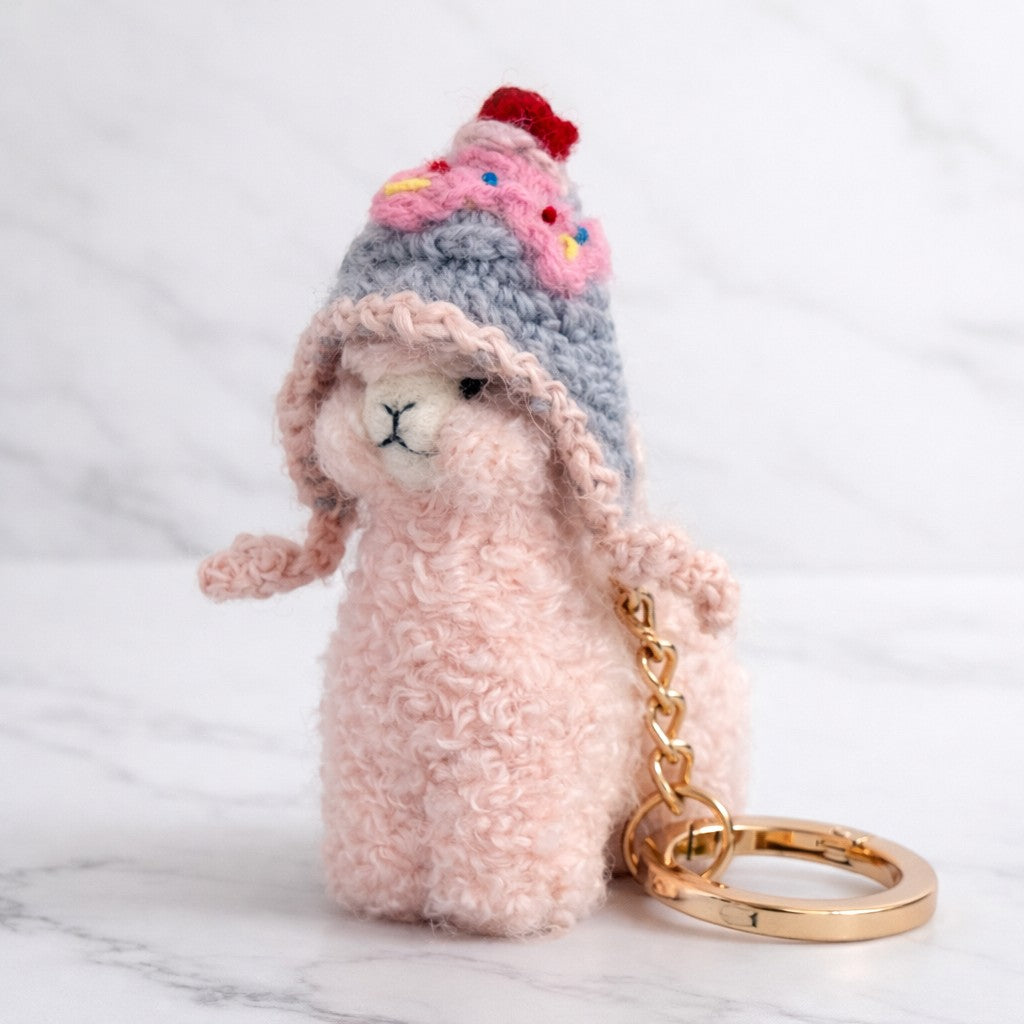Australian Alpaca Barn needle felted keychain alpaca with a cupcake hat