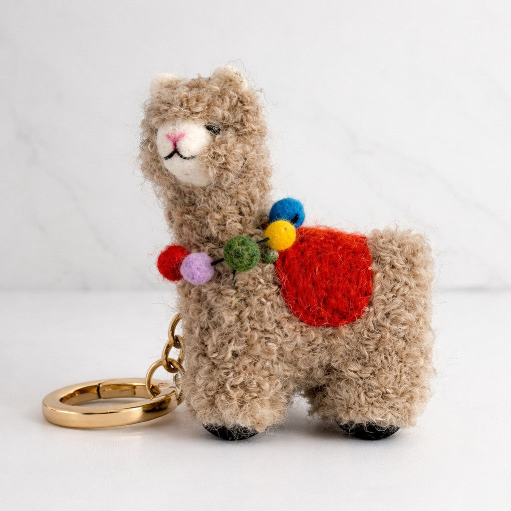 Alpaca keychain with colourful saddle and a necklace.