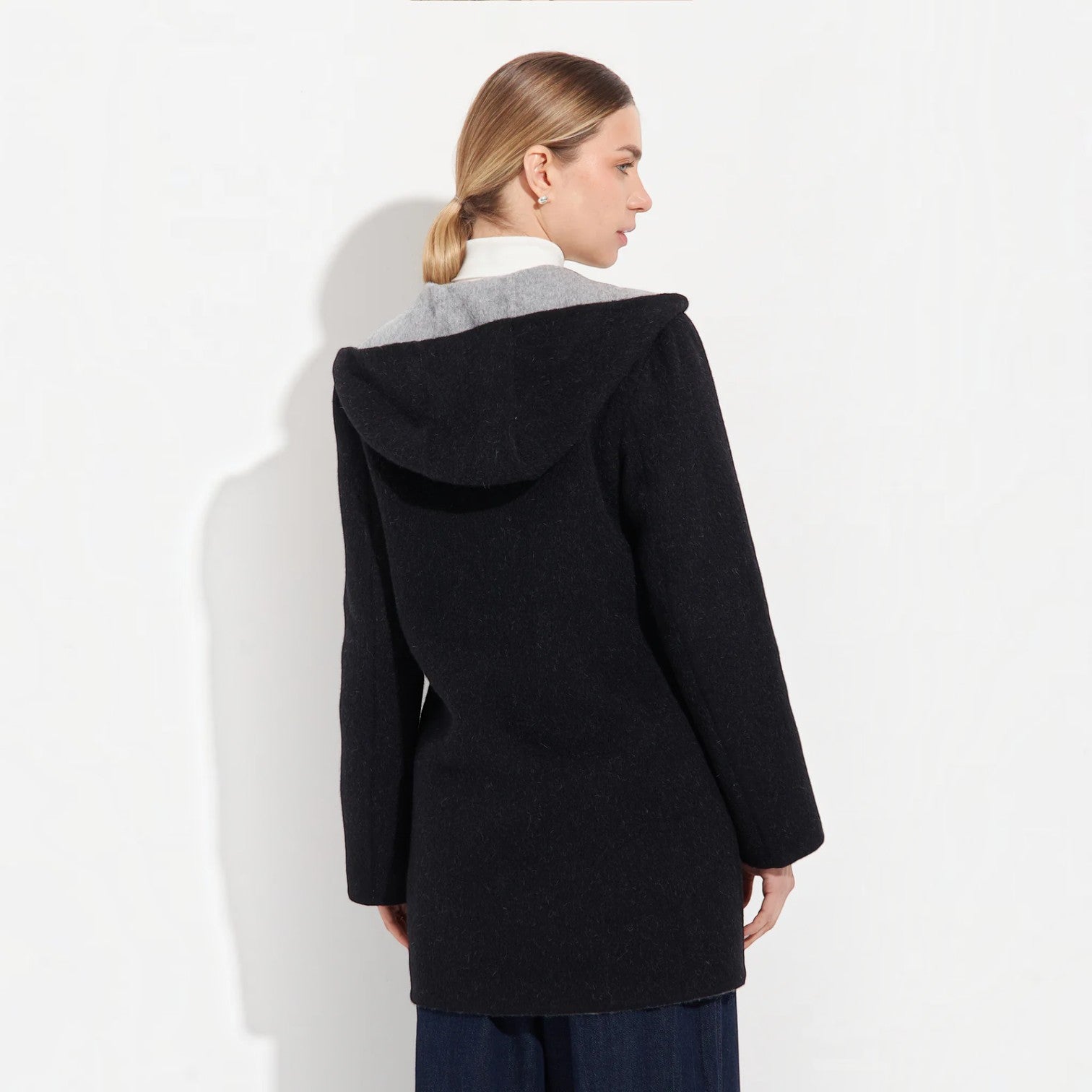 Grey alpaca blend coat with contrast black lapels and toggle buttons