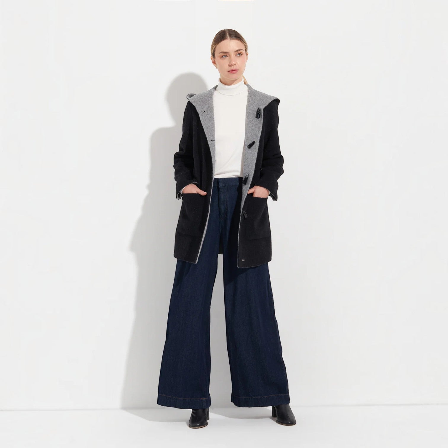Black and grey reversible women’s winter coat with relaxed fit