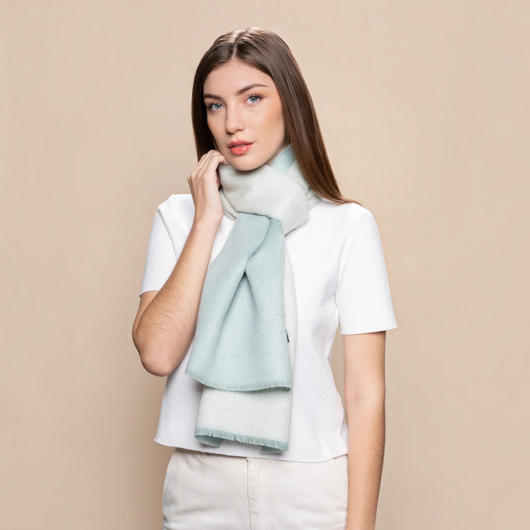 100% Baby Suri Alpaca reversible scarf in aquamarine and soft aquamarine with frayed edges