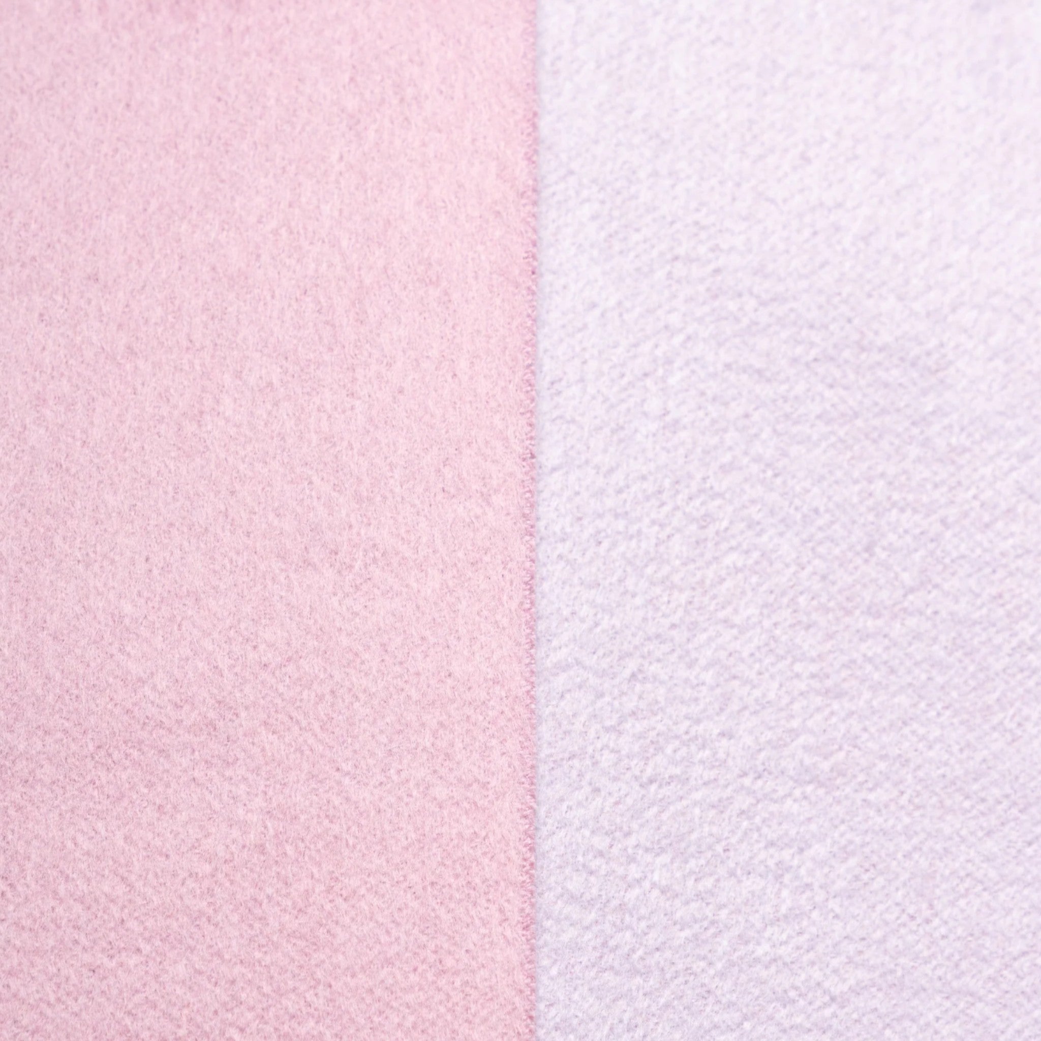 Close up of Pink and light purple Suri alpaca scarf styled to show its elegant reversible colour contrast