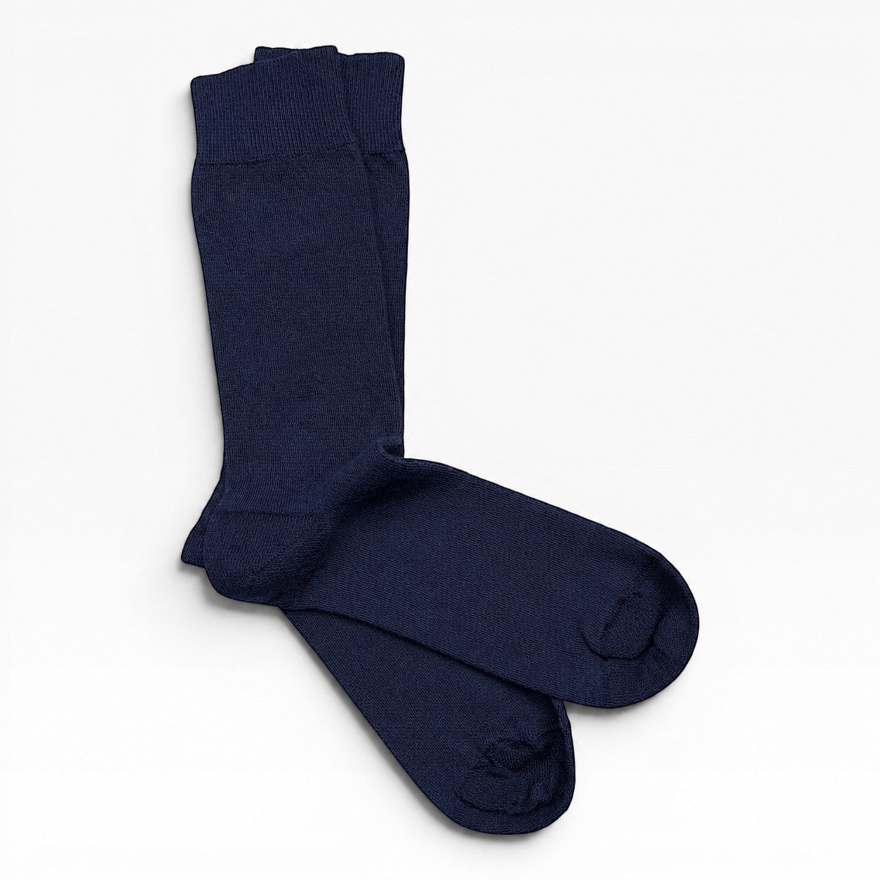 A pair of dark blue crew socks displayed in a crossed layout Australian made Dress socks