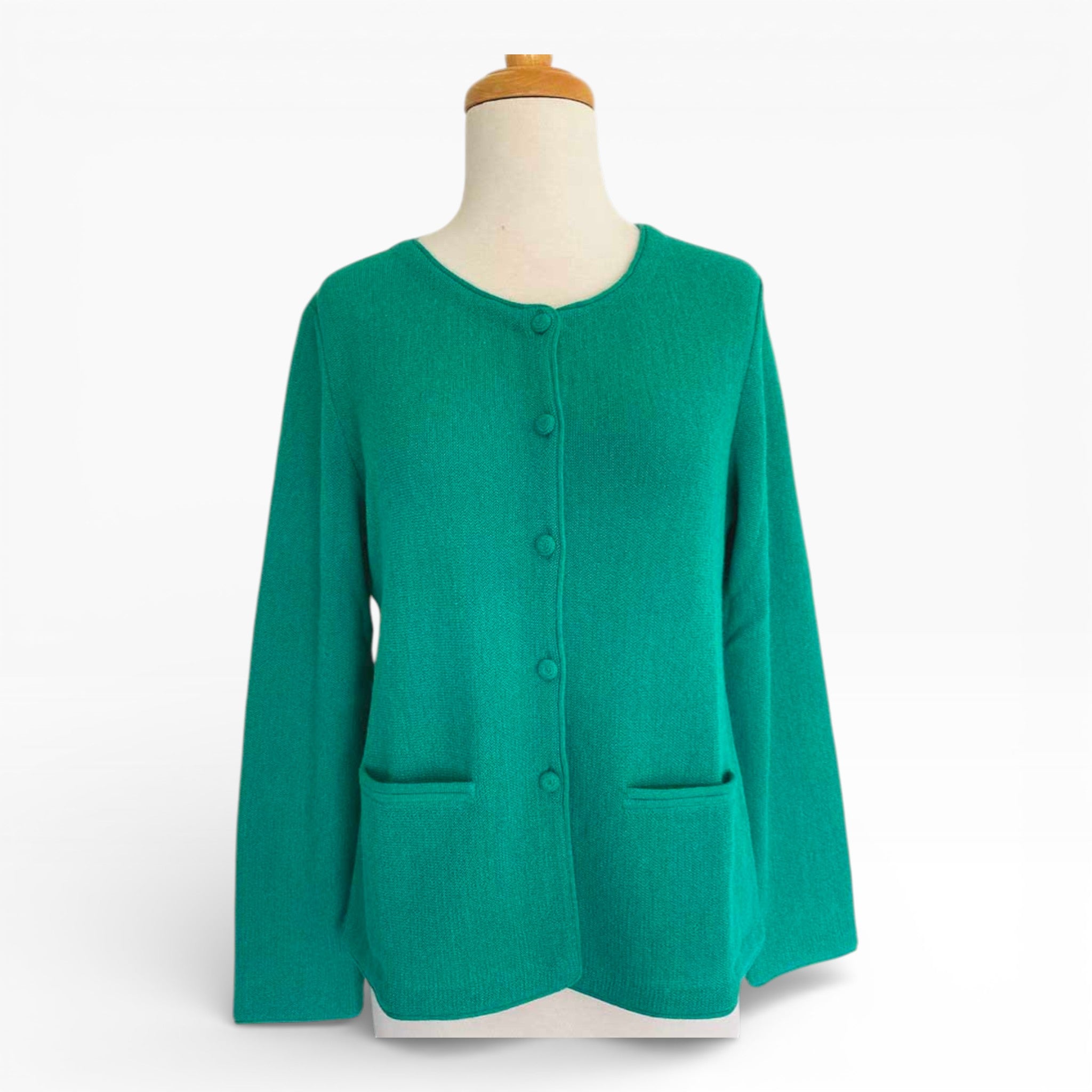 Soft knitted green cardigan with pockets with classic Chanel-style shape