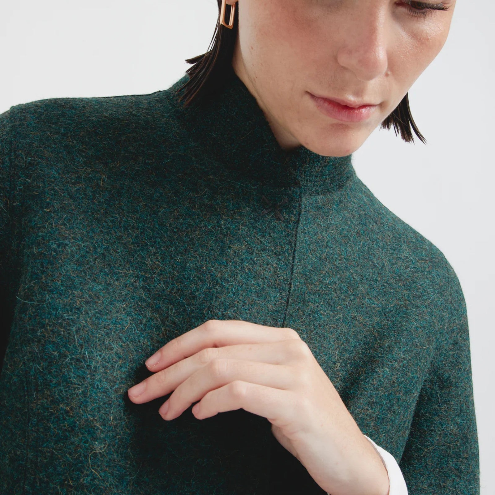 Close-up of Charlotte longline Alpaca and Wool Coat styled on female model