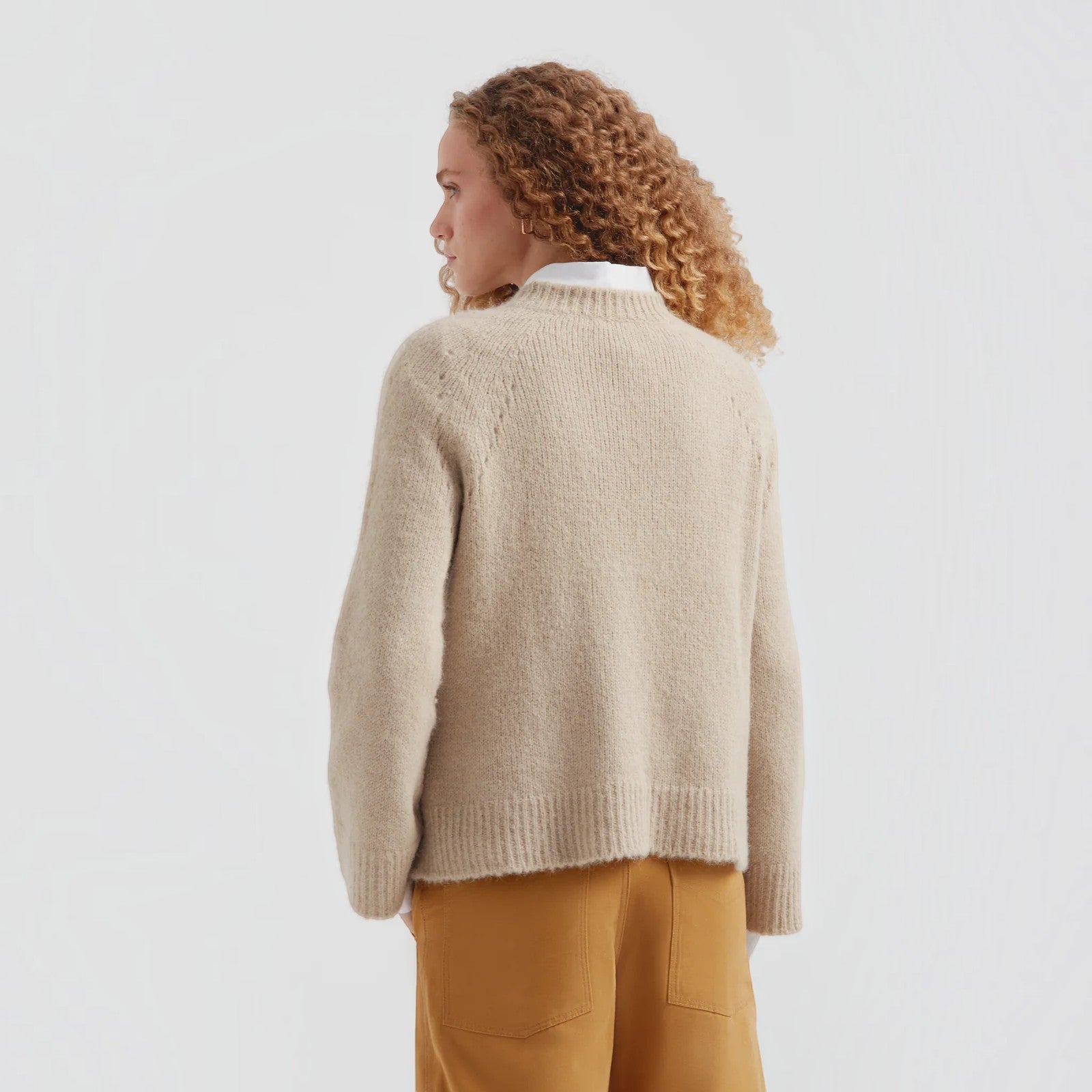 Women’s soft beige Suri Alpaca knit sweater with relaxed silhouette