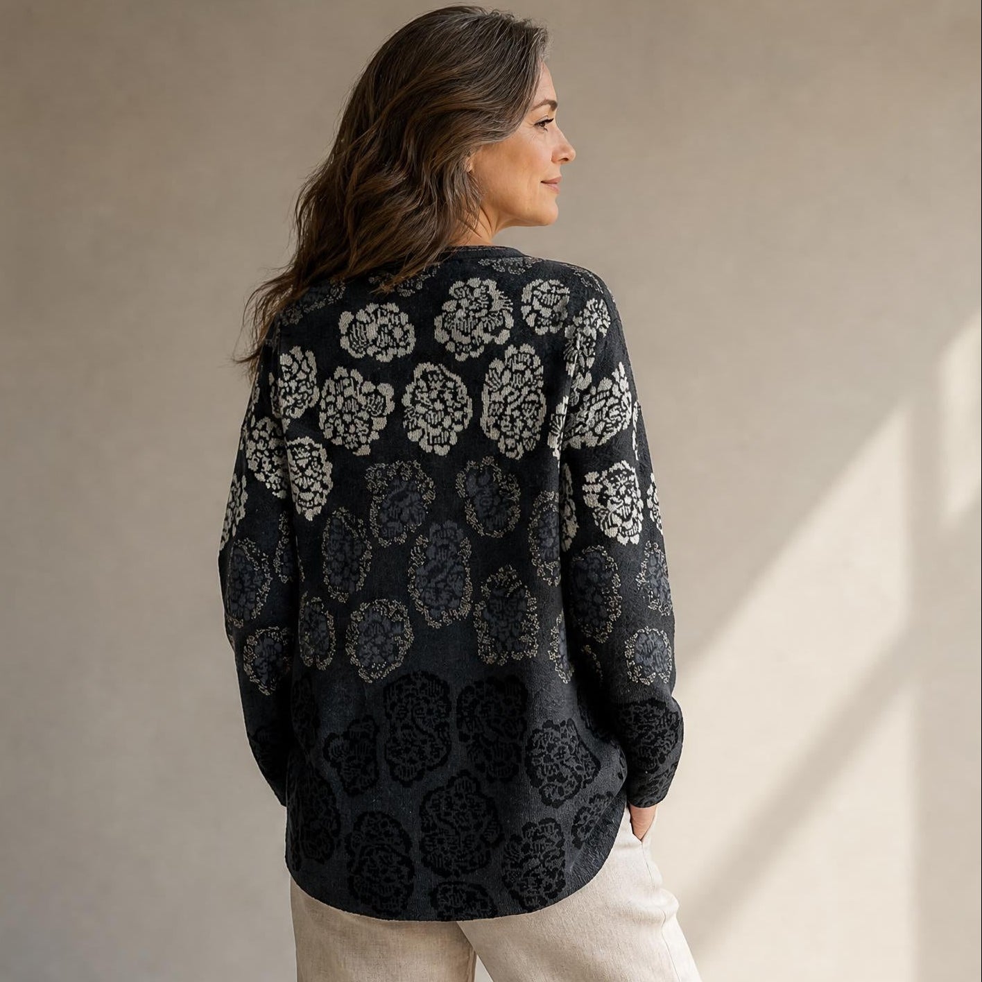 Women’s floral alpaca cardigan with bold chrysanthemum design and luxury texture