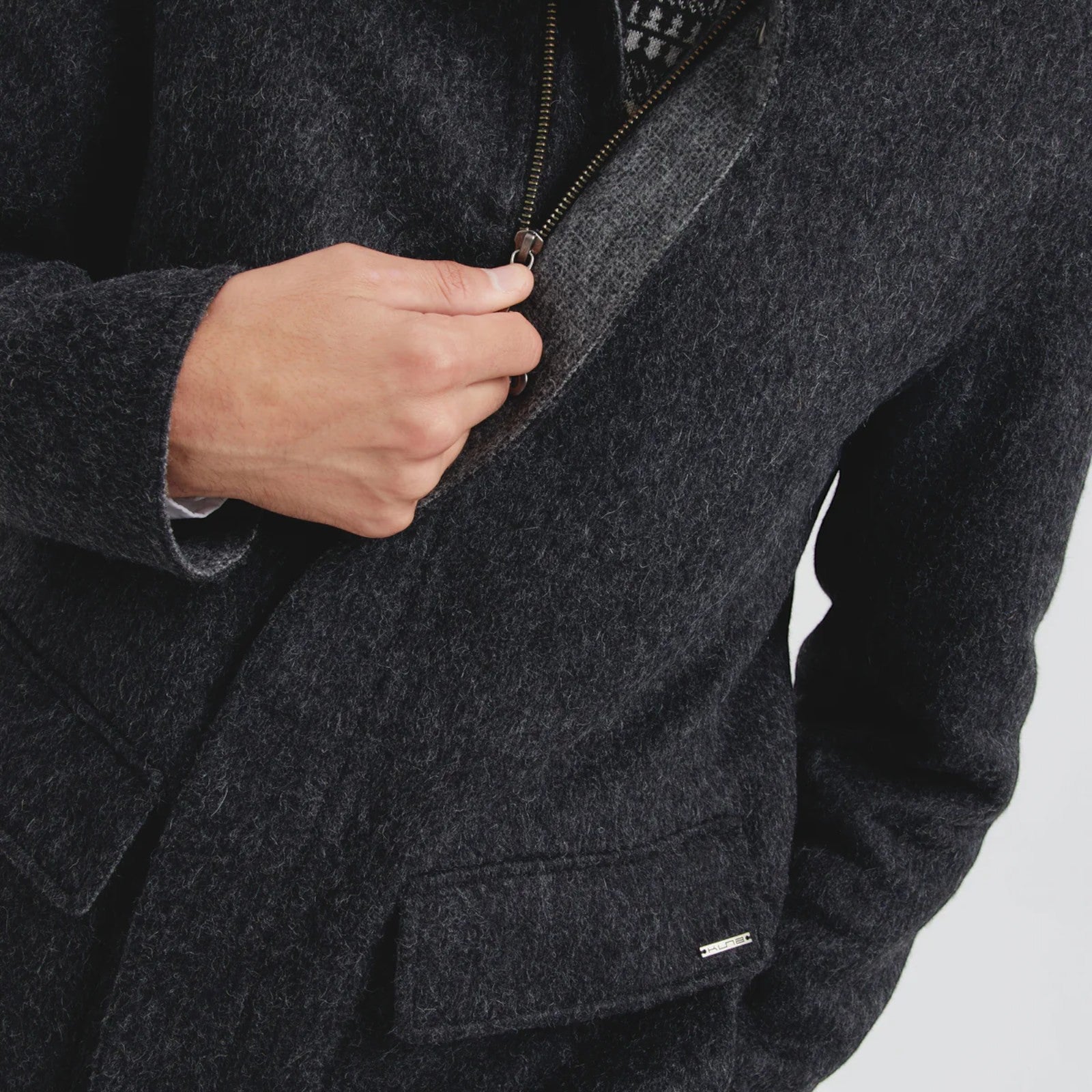 Close-up of Cumulus Baby Alpaca Coat showing soft texture and front zip detail