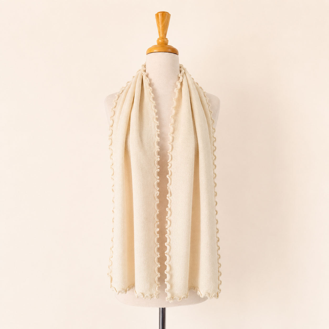 Curly Links Scarf in soft 100% baby alpaca with elegant curled edge detail