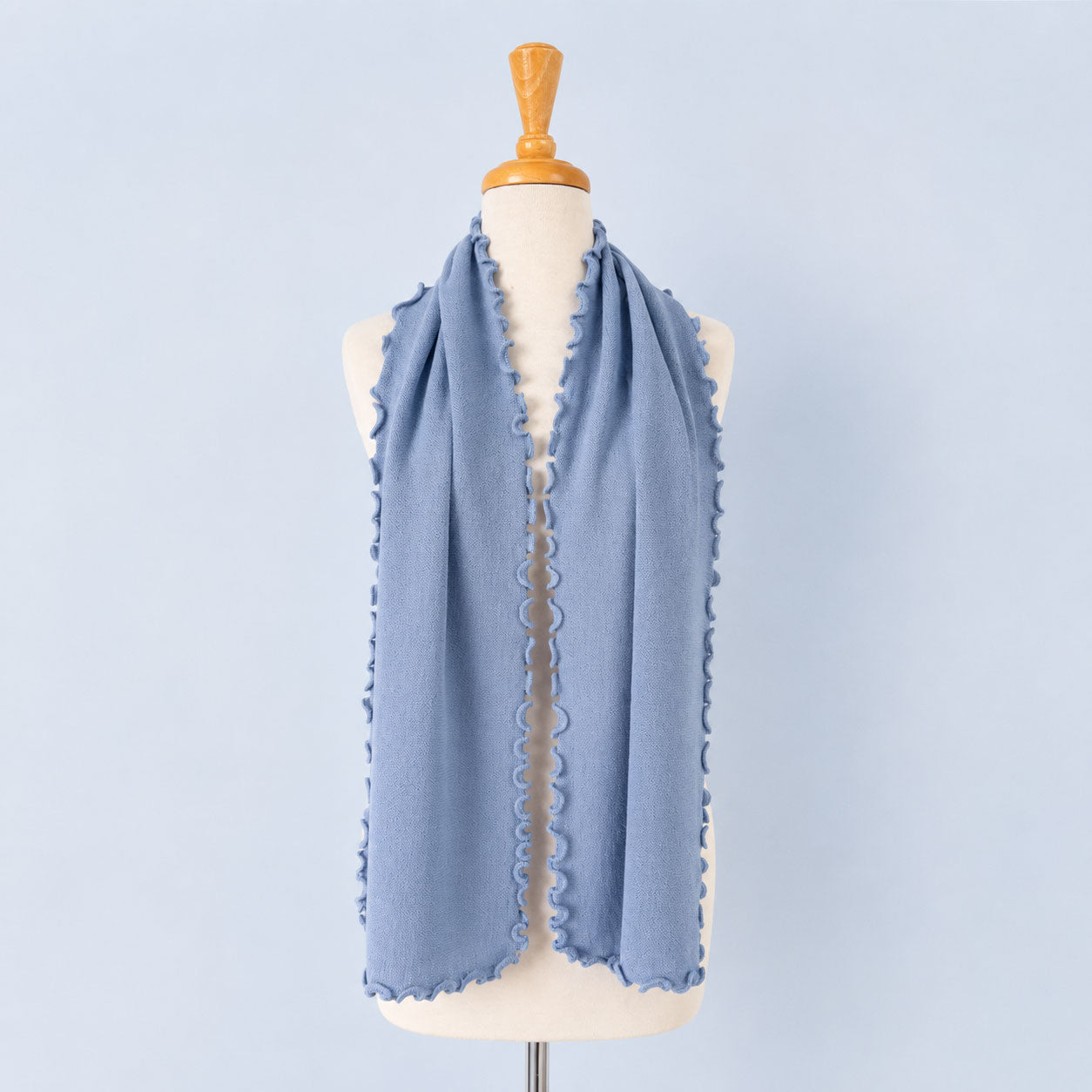 Luxuriously soft baby alpaca scarf with textured links knit and elegant ruffled edge