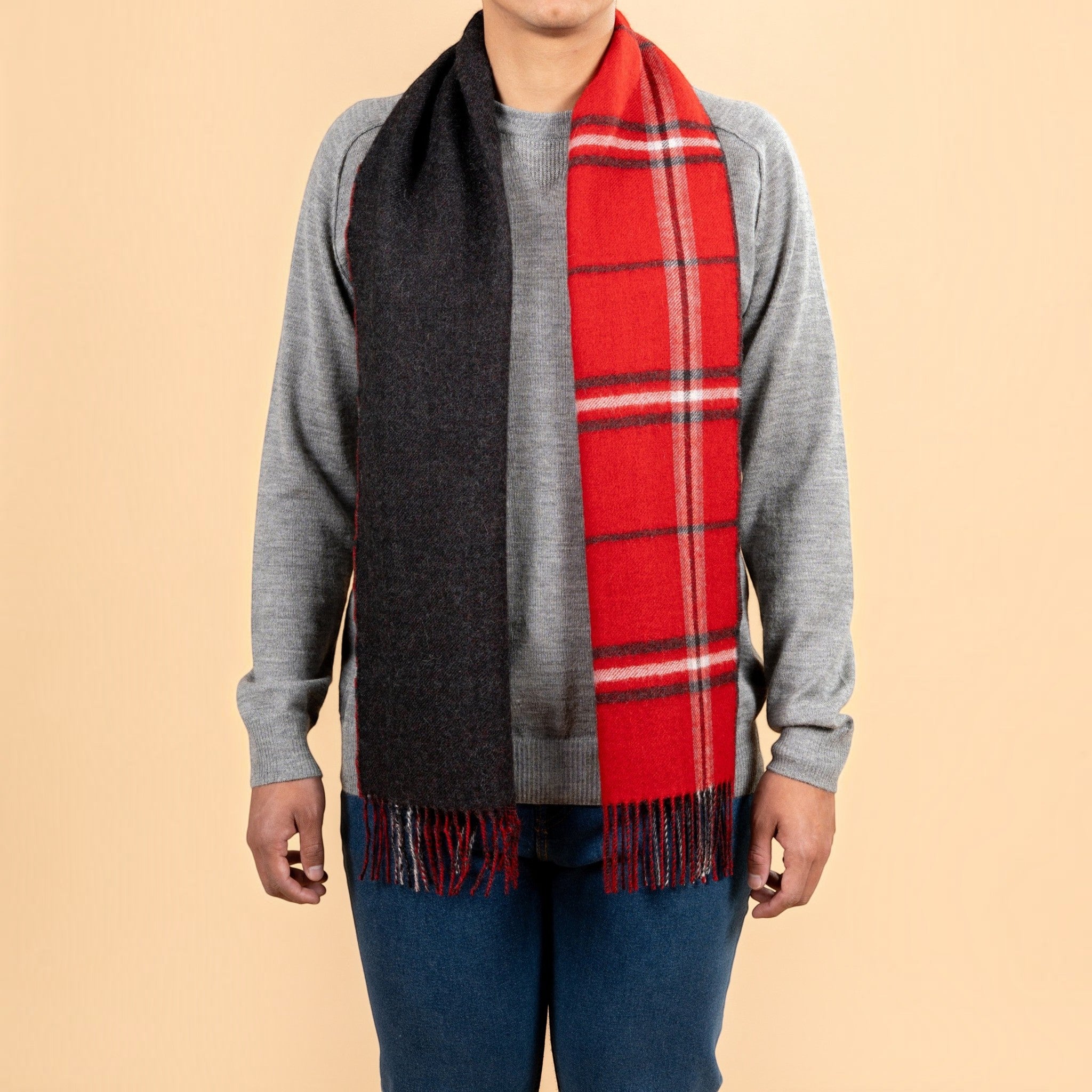 Reversible black and red Baby Alpaca plaid scarf showing solid and checked sides