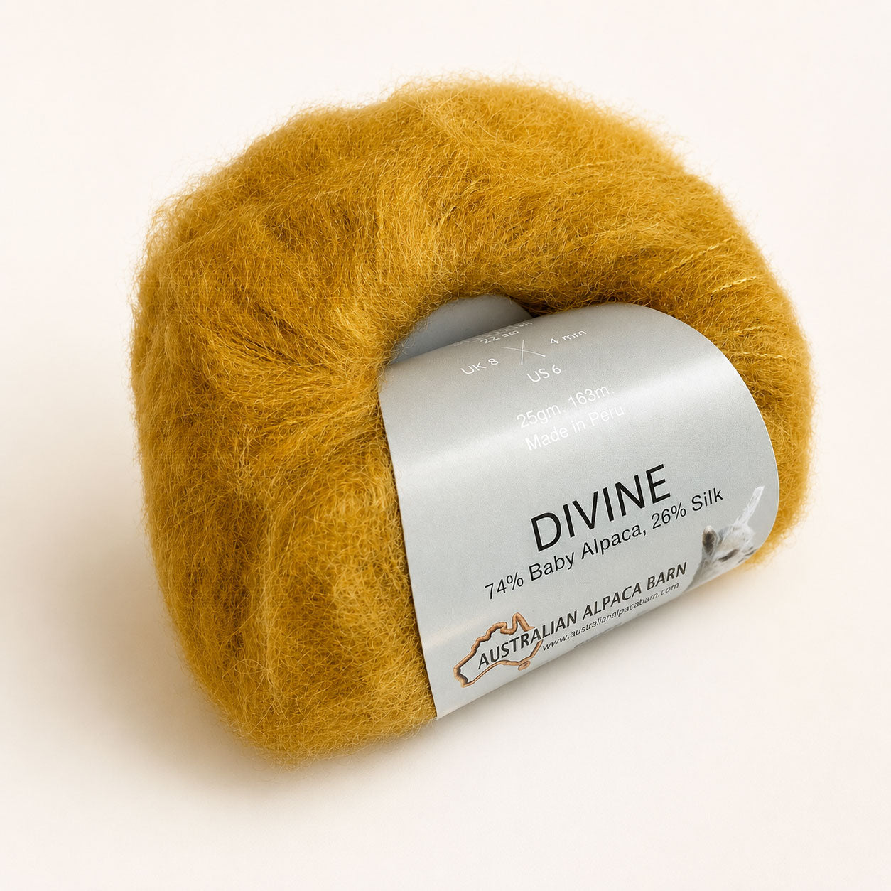 Soft alpaca silk yarn with a mohair-style halo in yellow gold