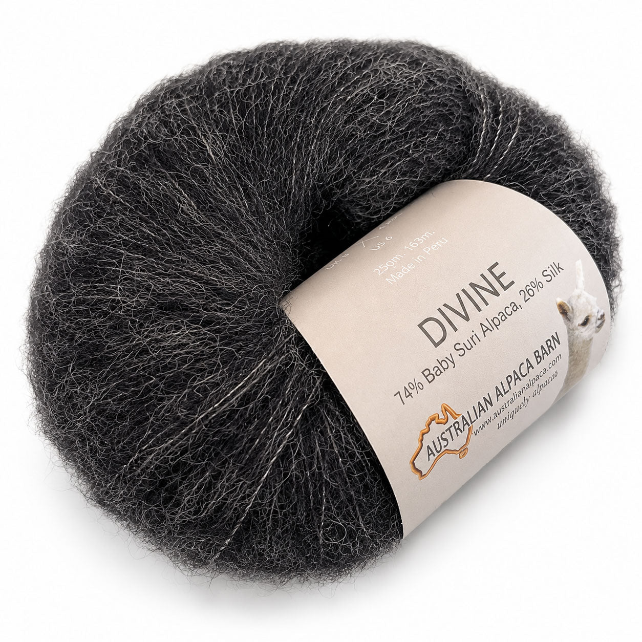 A single ball of dark gray and black alpaca wool yarn with a beige paper label reading 'DIVINE' and 'Australian Alpaca Barn'.
