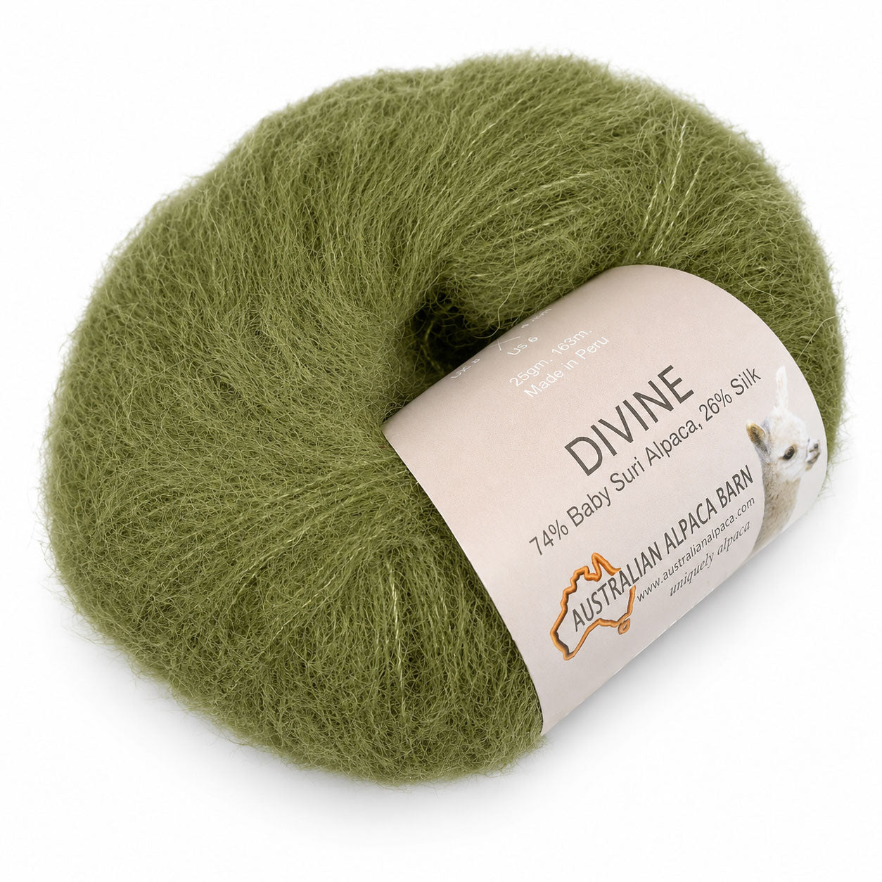 A ball of dusty sage green alpaca yarn with a paper label reading 'DIVINE' and 'Australian Alpaca Barn', photographed on a clean white background.