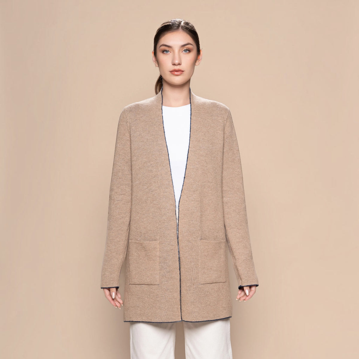 Front view of reversible alpaca swing cardigan beige side