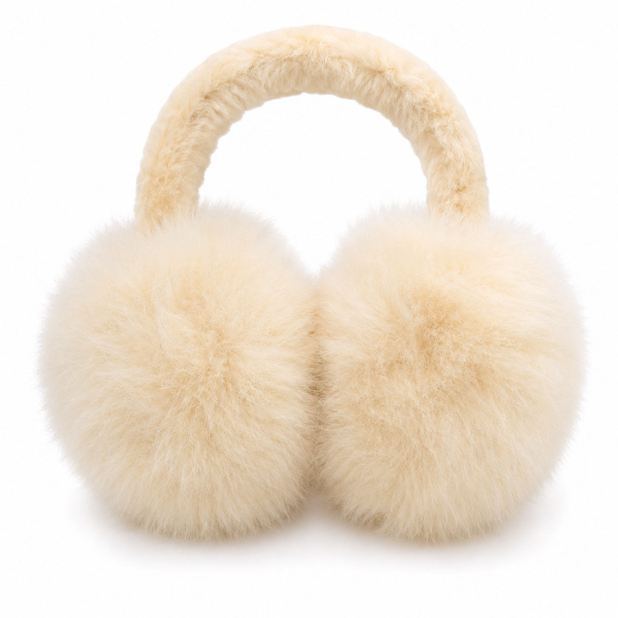 Alpaca fur ear muffs in soft beige, cosy cold weather ear warmers.