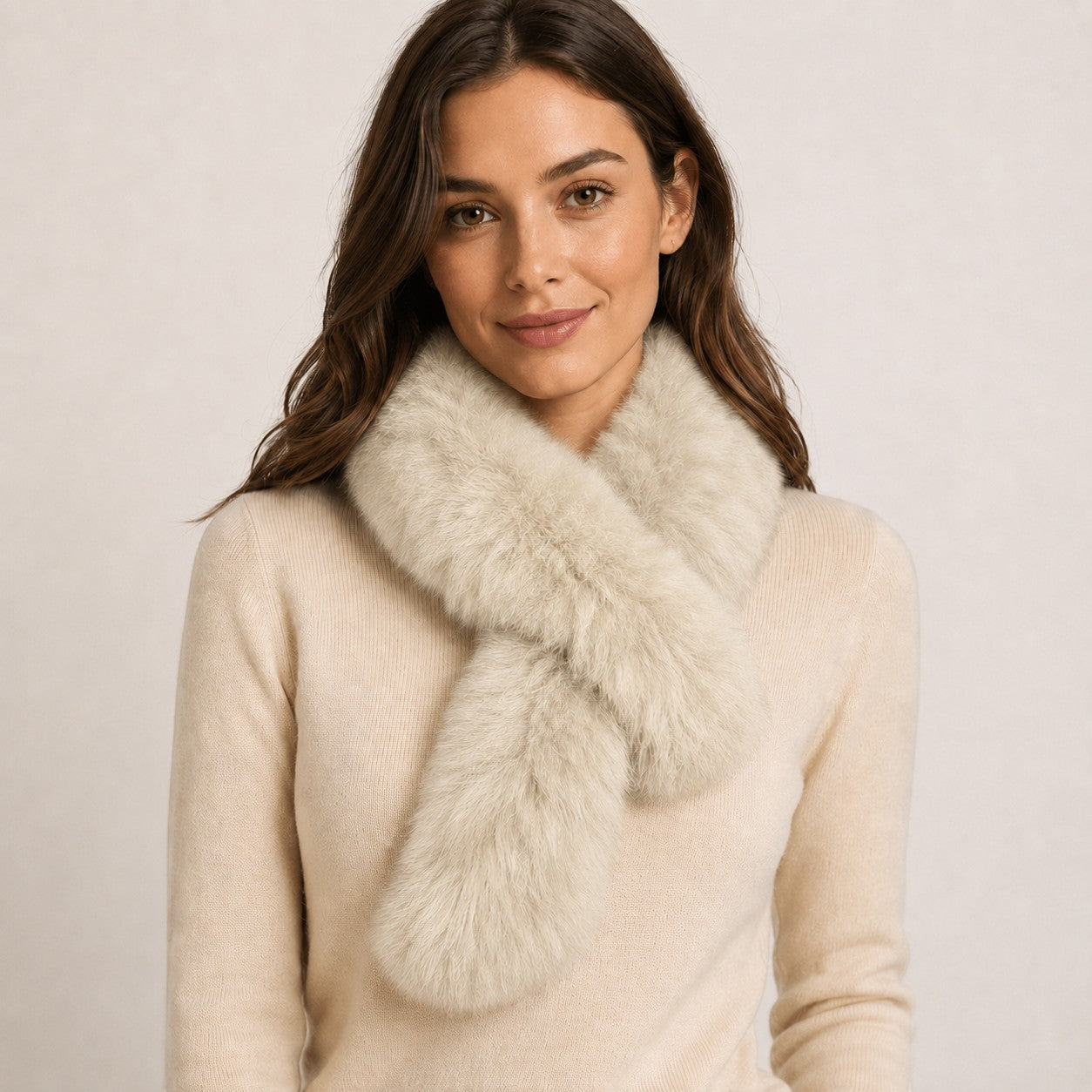 Natural taupe baby alpaca fur pull-through scarf styled on a female model