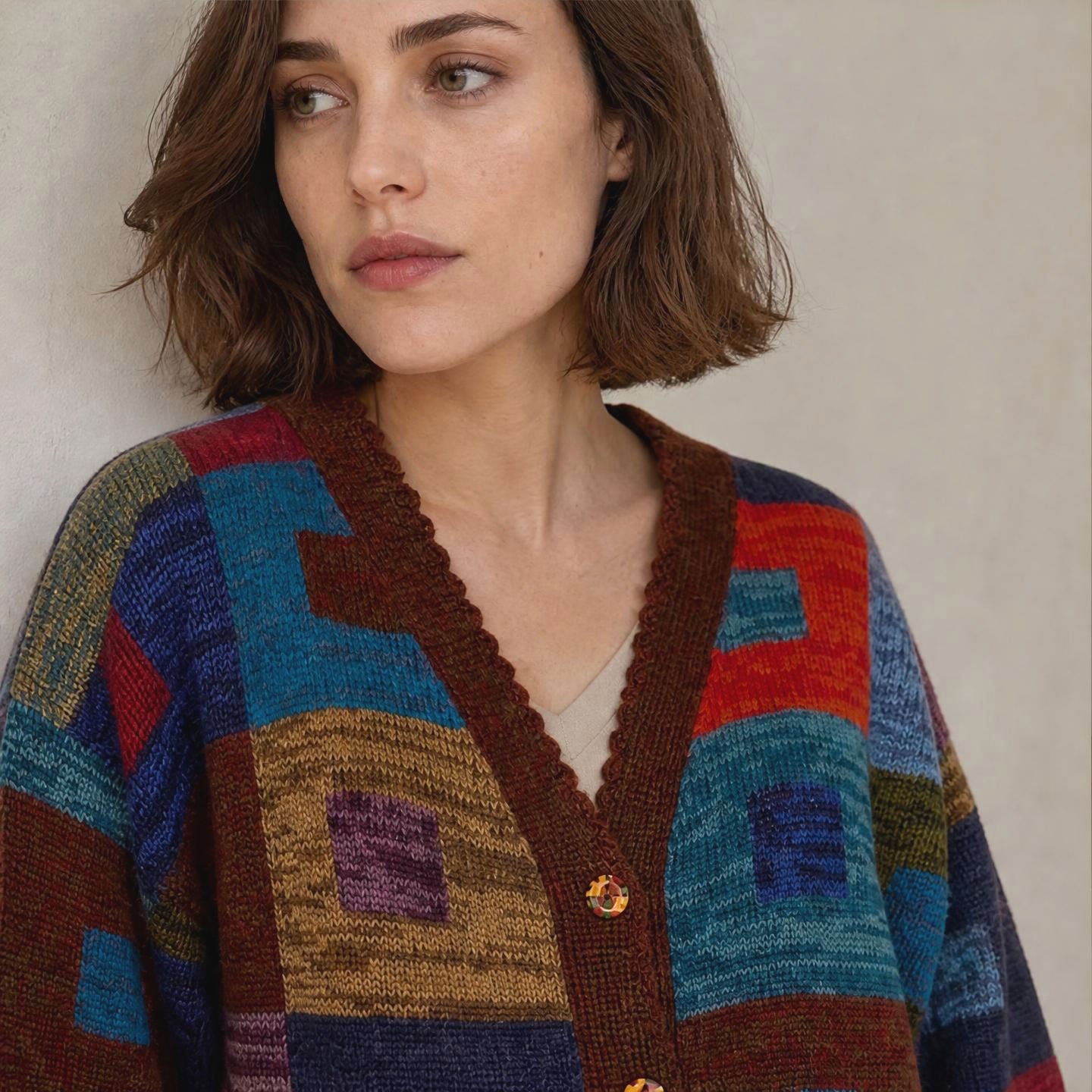 Long hand knitted alpaca cardigan with playful patchwork design